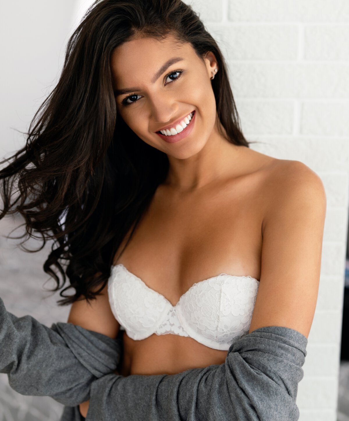 Austin breast implant replacement model with black hair