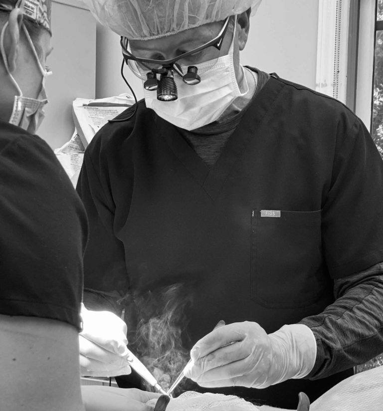 Dr. Robert Caridi performing gynecomastia surgery at the Austin Gynecomastia Center
