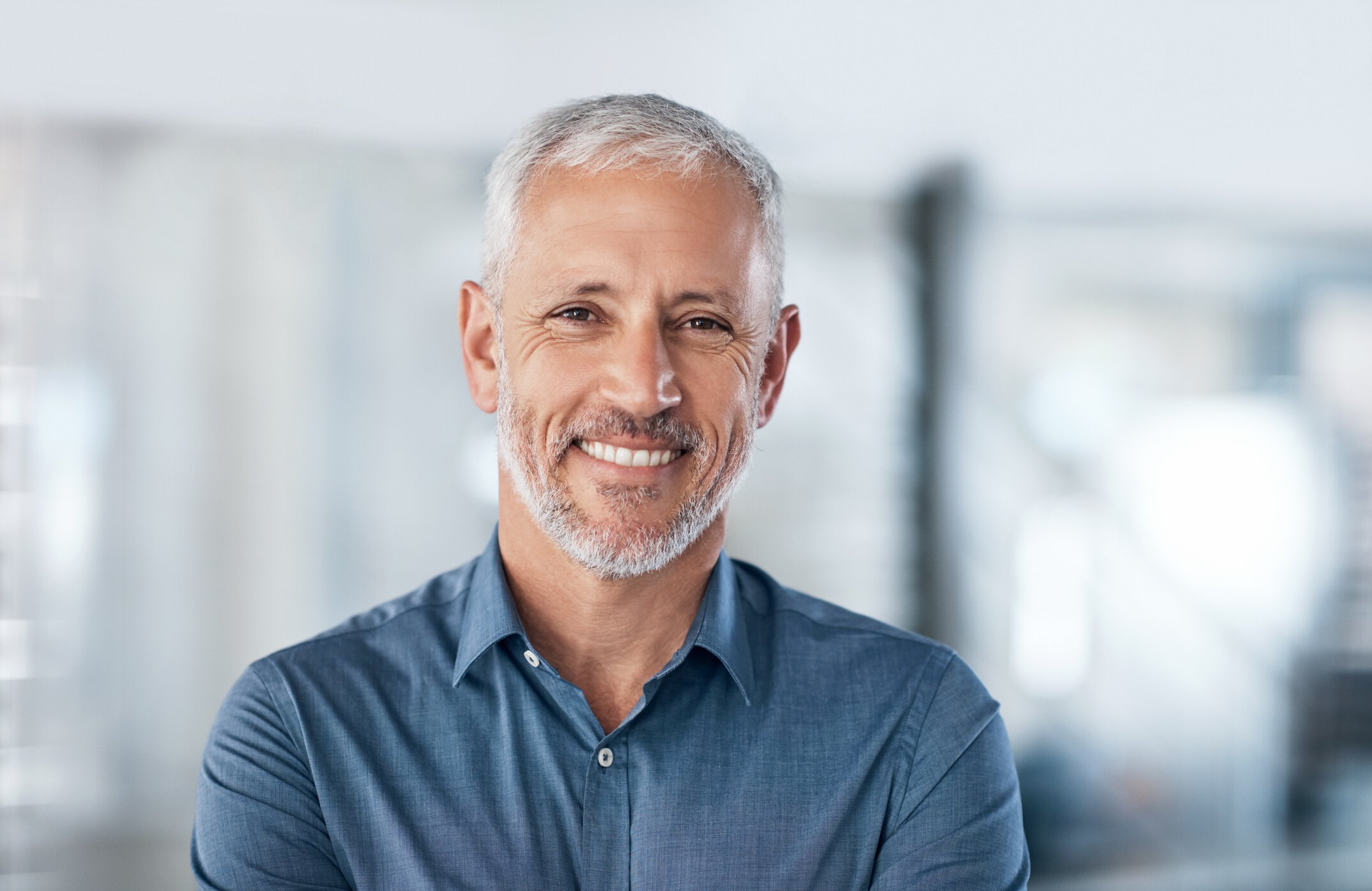 Austin anti aging treatments for men model with blue shirt
