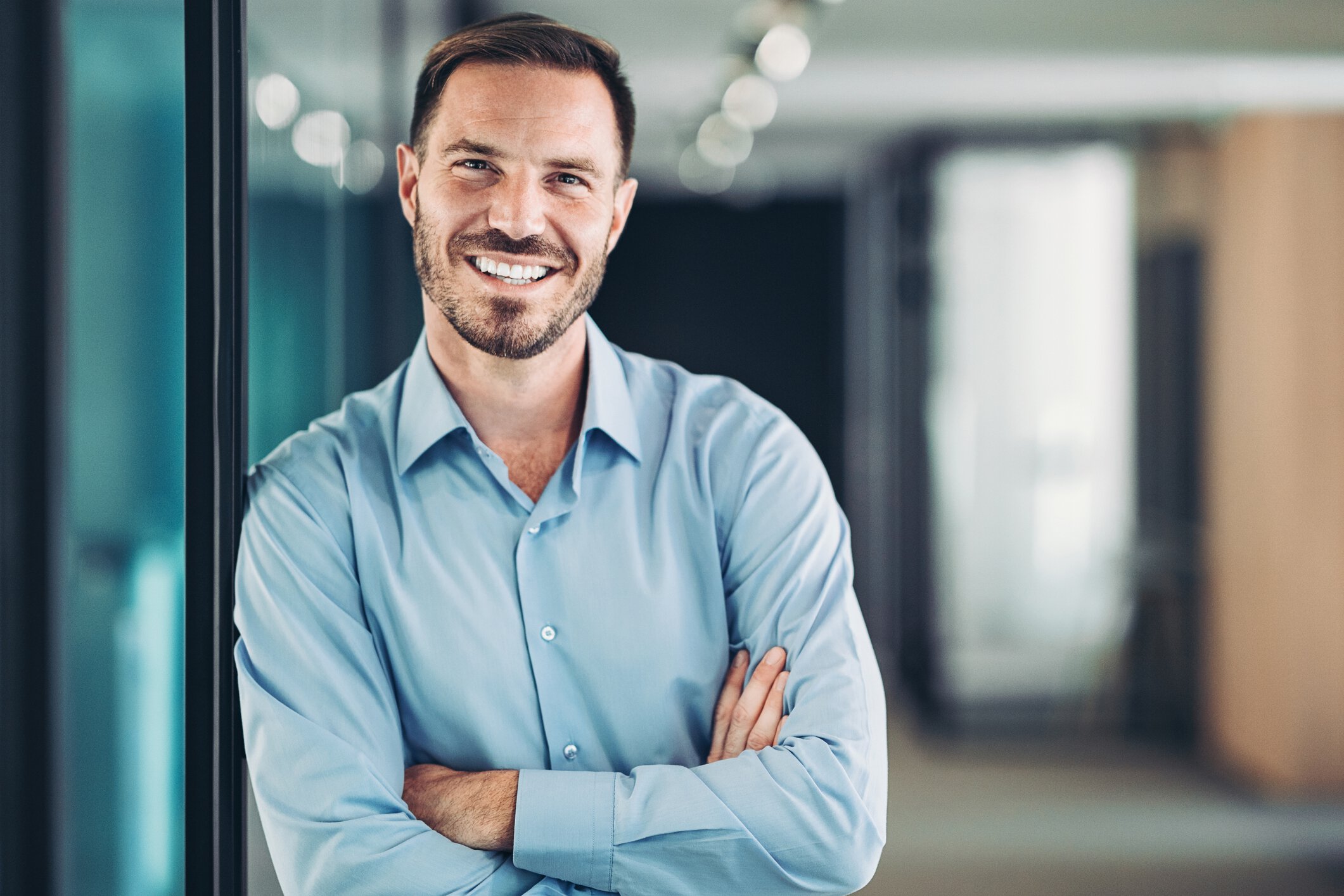 Austin anti aging treatments for men model with blue shirt